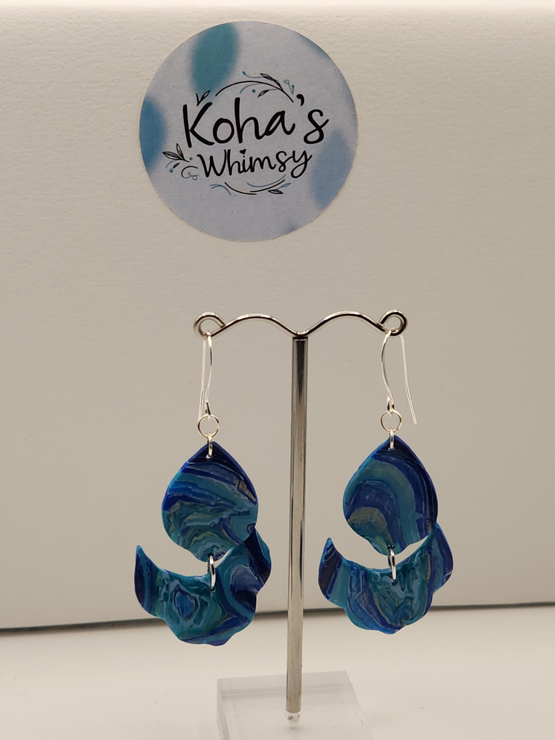 Blue agate large dangle earrings displayed showing elegant cascading design and soothing blue hues