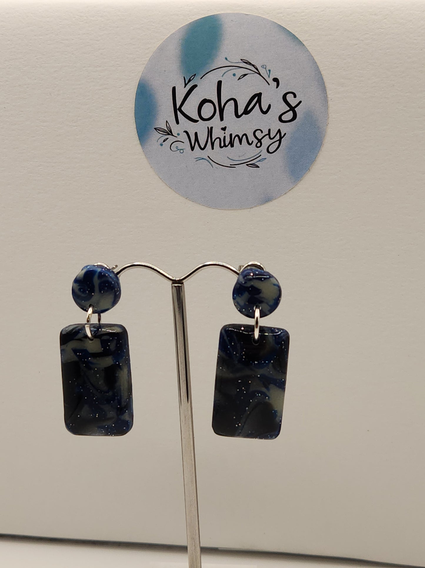 Starlight shimmer stud earrings displayed to show size and shape