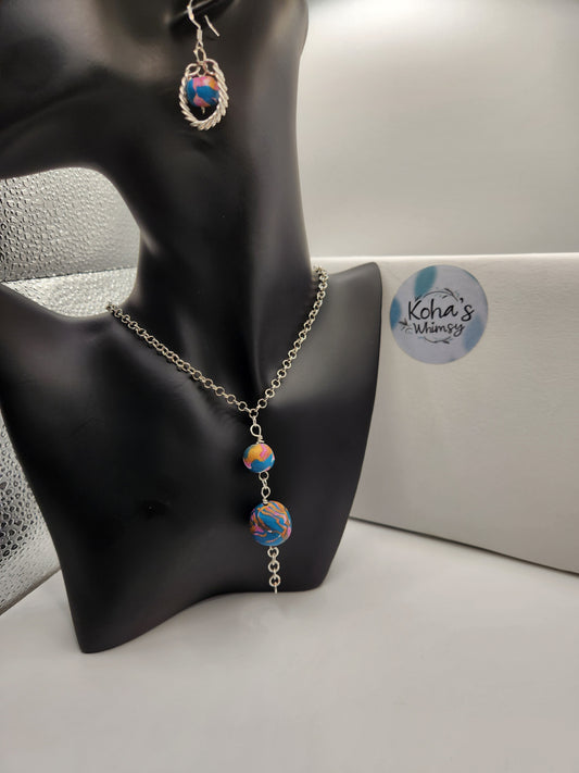 One of a kind handmade coiled wire beaded jewellery set with pink, blue and gold polymer clay beads
